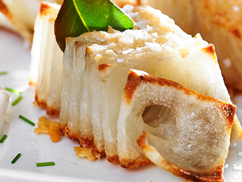 Domino potatoes on white plate