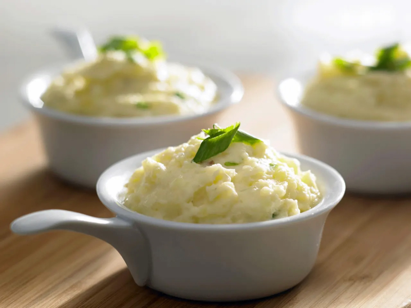 Mashed potatoes in white ramekins