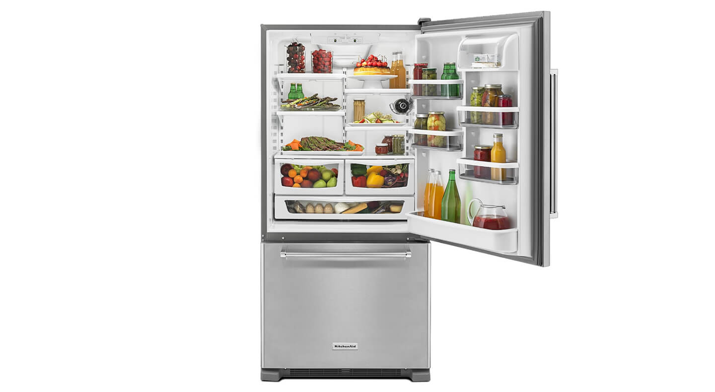 KitchenAid® bottom freezer refrigerator stocked with fresh food