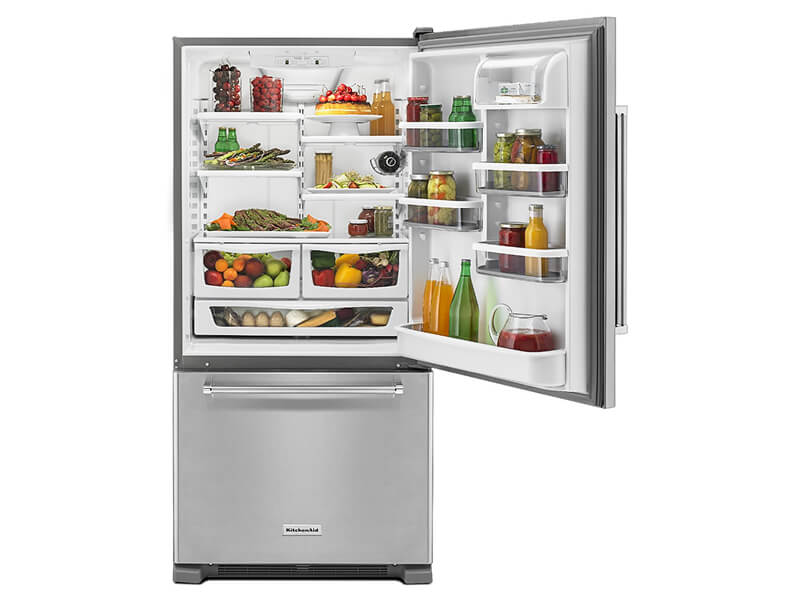 KitchenAid® bottom freezer refrigerator stocked with fresh food