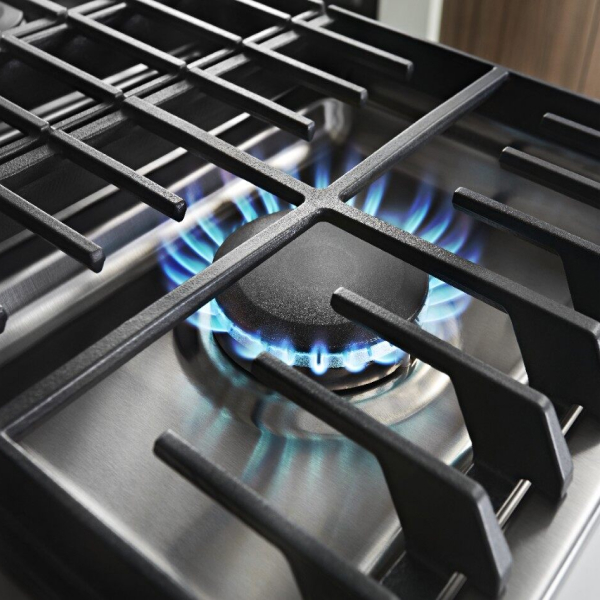 Burner ignited with blue flames flickering