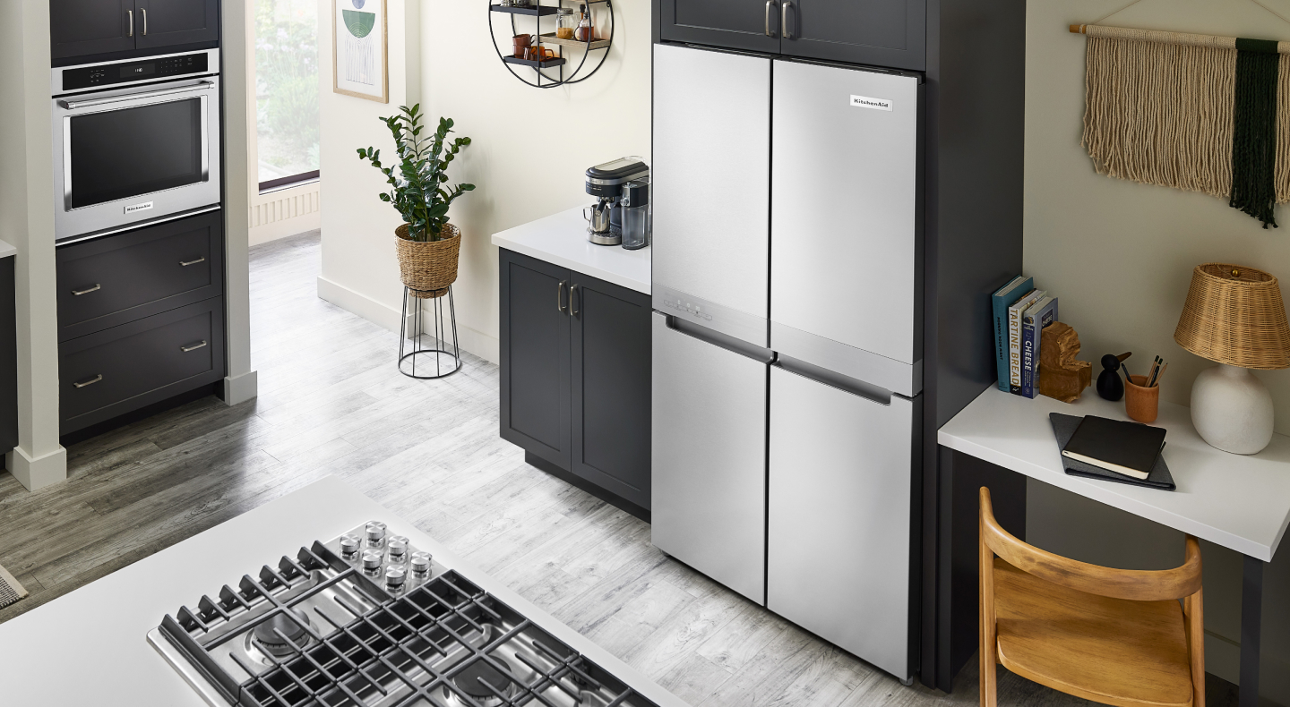 KitchenAid® 4-door refrigerator built into black cabinetry KitchenAid® 4-door refrigerator built into black cabinetry