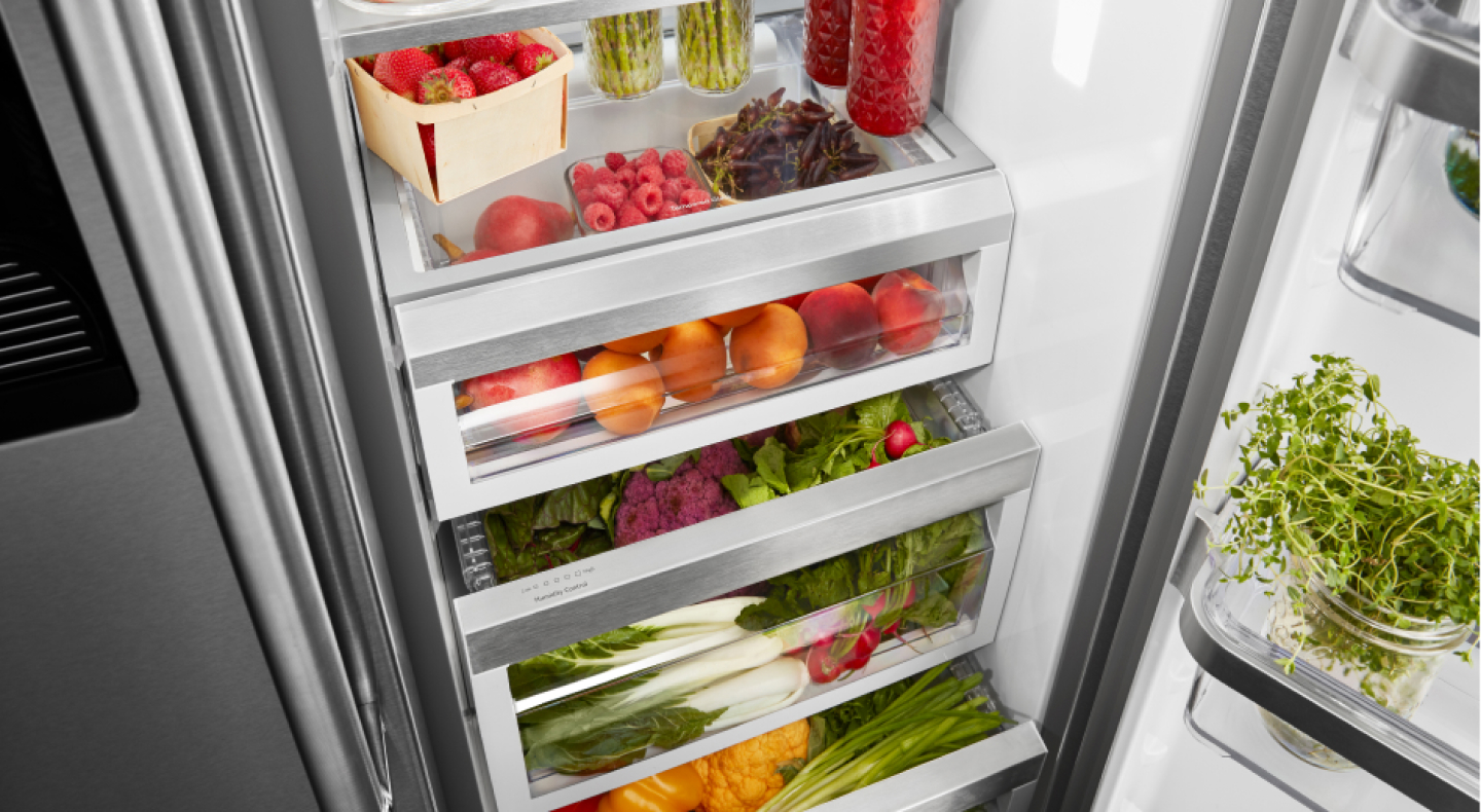 Birds-eye view of fresh product organized inside of a refrigerator Birds-eye view of fresh product organized inside of a refrigerator