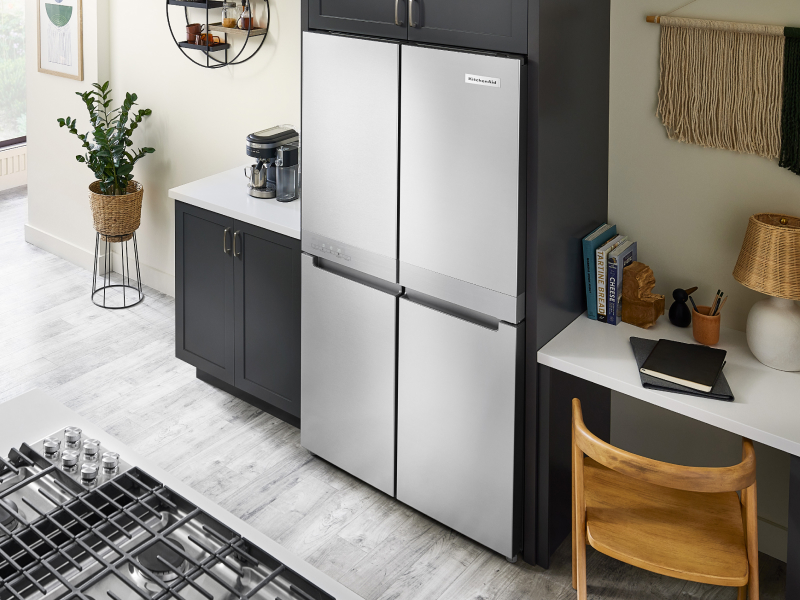 KitchenAid® 4-door refrigerator built into black cabinetry KitchenAid® 4-door refrigerator built into black cabinetry