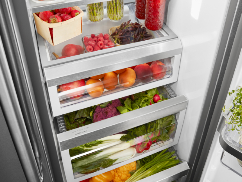 Birds-eye view of fresh product organized inside of a refrigerator Birds-eye view of fresh product organized inside of a refrigerator