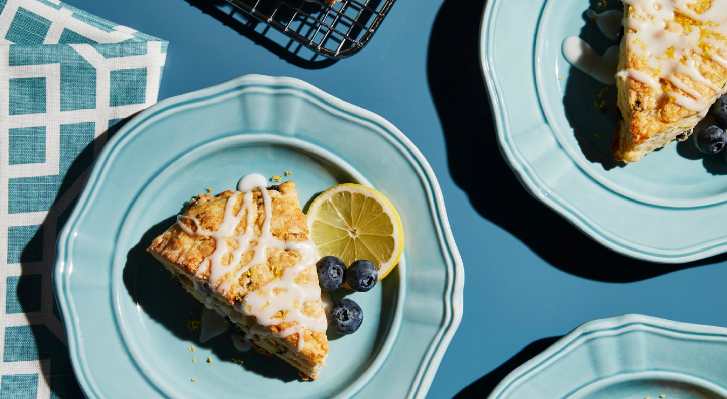 Lemon blueberry scone on plate. Lemon blueberry scone on plate.