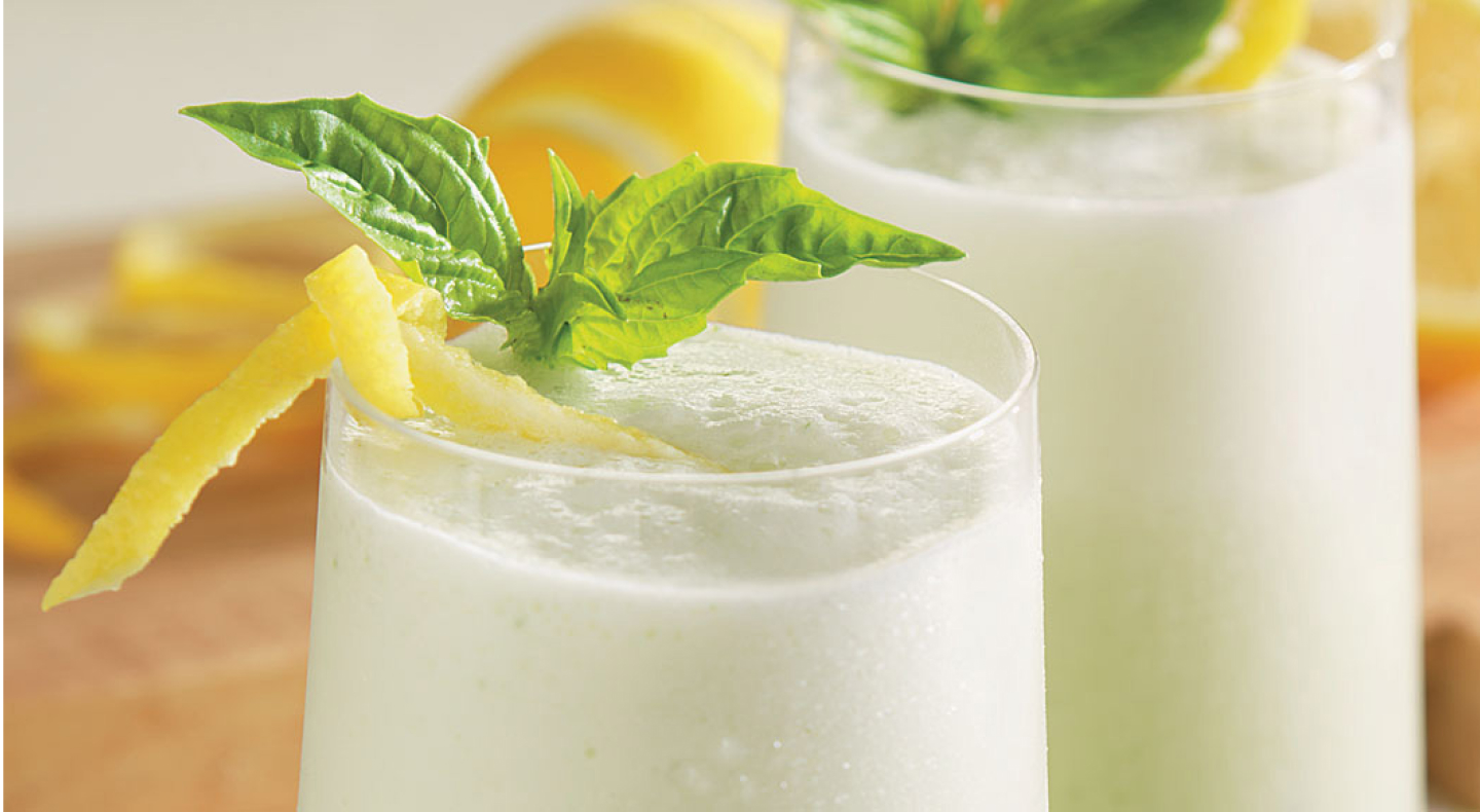 Margaritas with lemon peels and mint on top. Margaritas with lemon peels and mint on top.