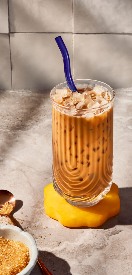 Iced latte in a tall glass Iced latte in a tall glass