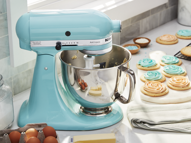 KitchenAid brand stand mixer mixing frosting for sugar cookies