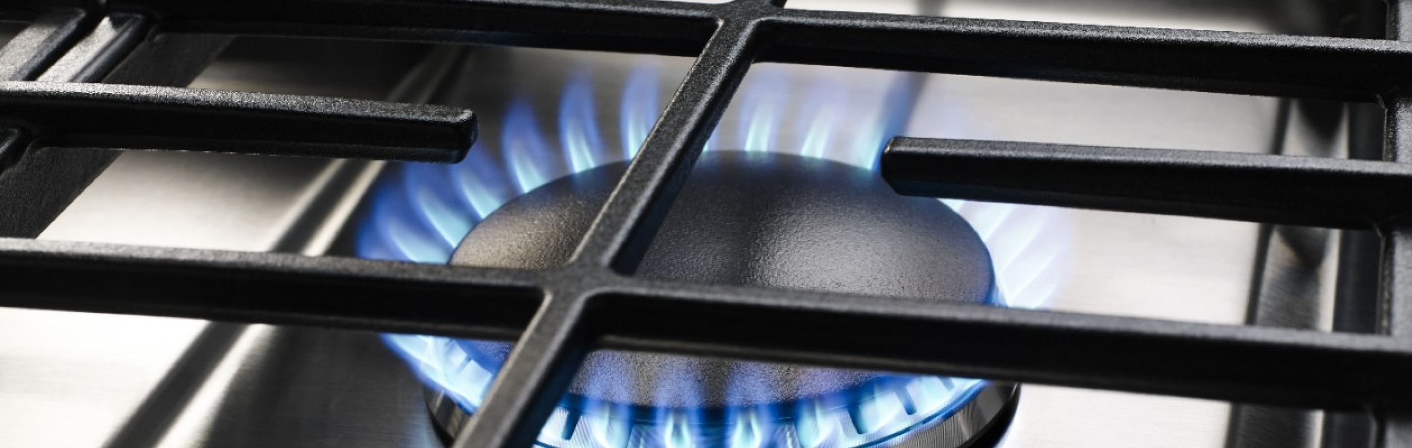Close up image of a gas stovetop burner