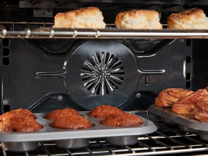 A convection fan pushing air to bake food