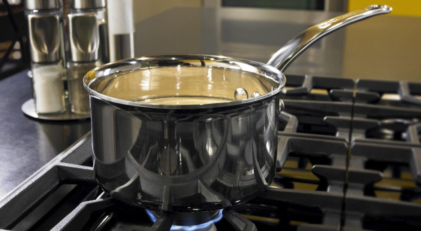 Saucepan on a stovetop Saucepan on a stovetop
