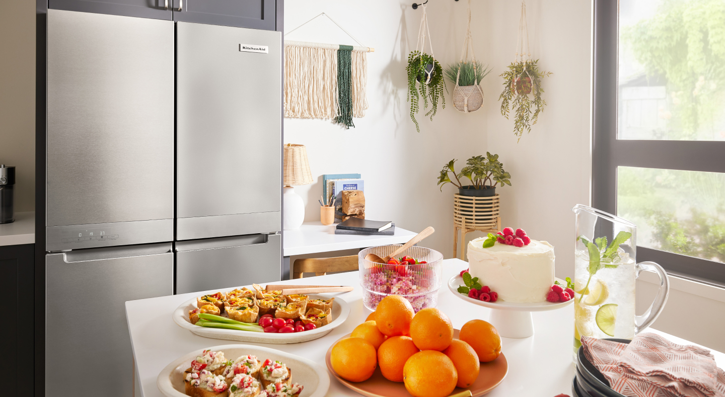 A KitchenAid® refrigerator in a modern kitchen. A KitchenAid® refrigerator in a modern kitchen.