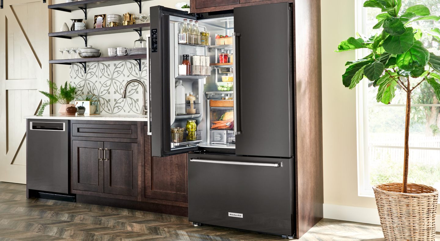 A KitchenAid® refrigerator in a modern kitchen.