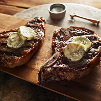 T-bone steaks with blue cheese butter
