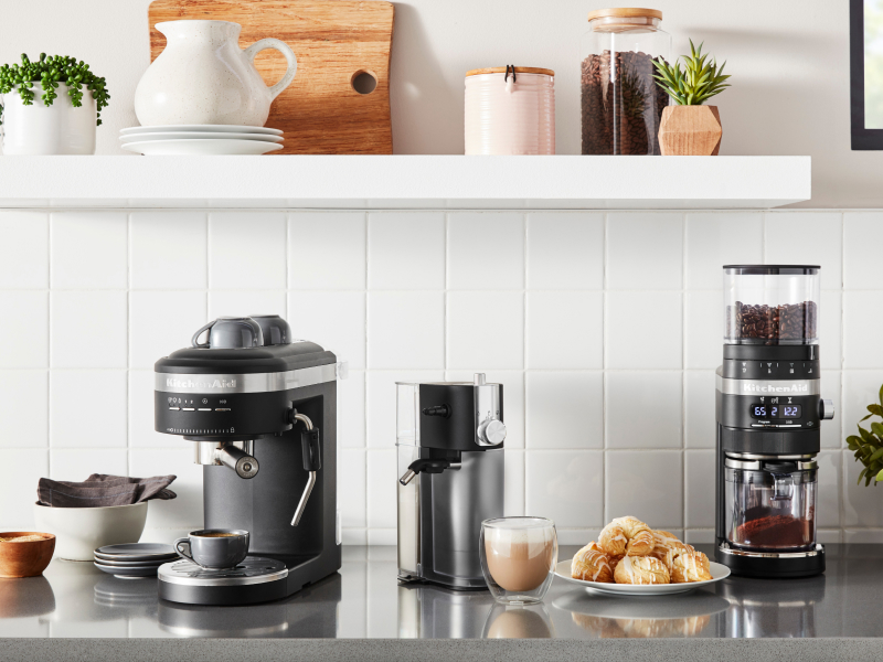 Coffee-making appliances from KitchenAid brand on counter with scones Coffee-making appliances from KitchenAid brand on counter with scones