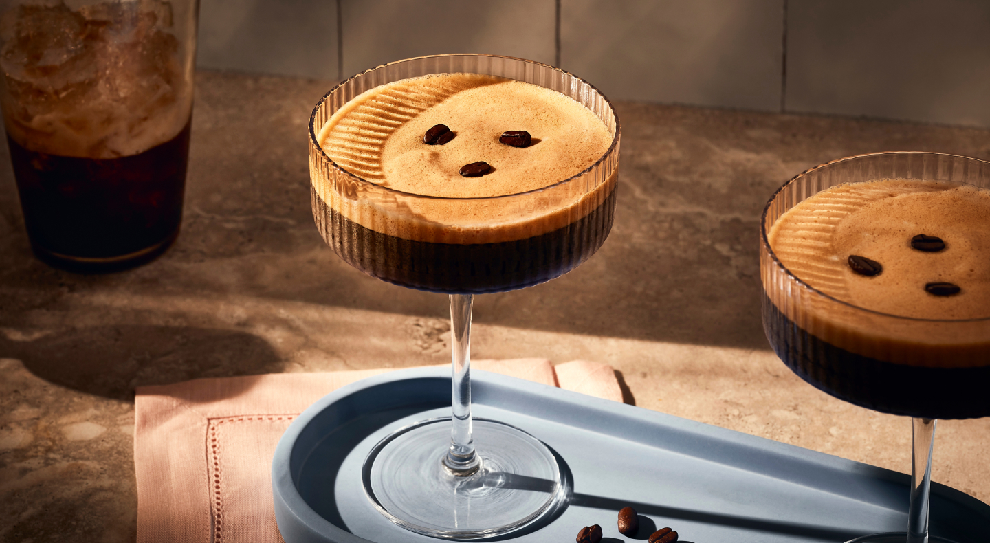 Espresso martini garnished with three coffee beans  Espresso martini garnished with three coffee beans