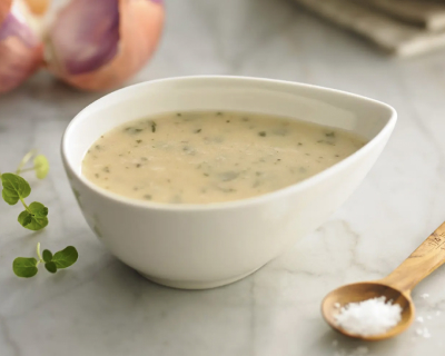 A dish of homemade vinaigrette dressing.