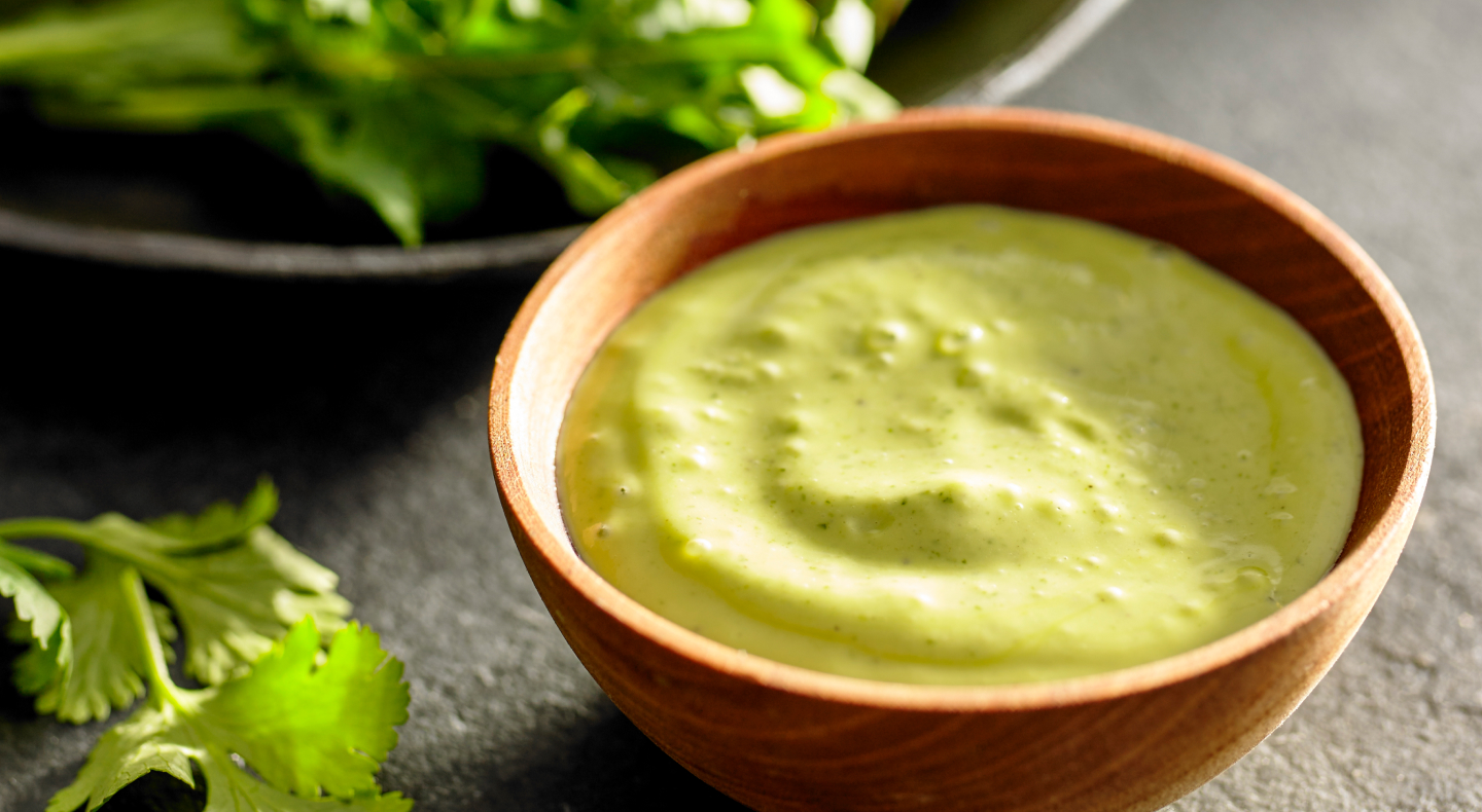 A dish of avocado cilantro dressing. A dish of avocado cilantro dressing.