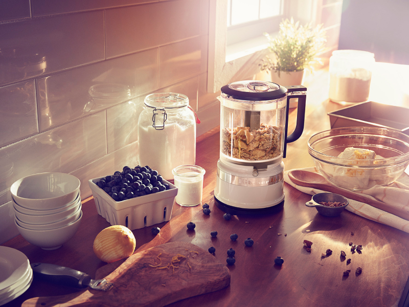 KitchenAid® food chopper on countertop with blueberries and cream cheese KitchenAid® food chopper on countertop with blueberries and cream cheese