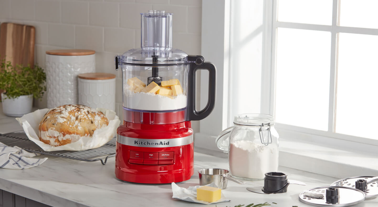 KitchenAid® food processor with bread ingredients on countertop KitchenAid® food processor with bread ingredients on countertop