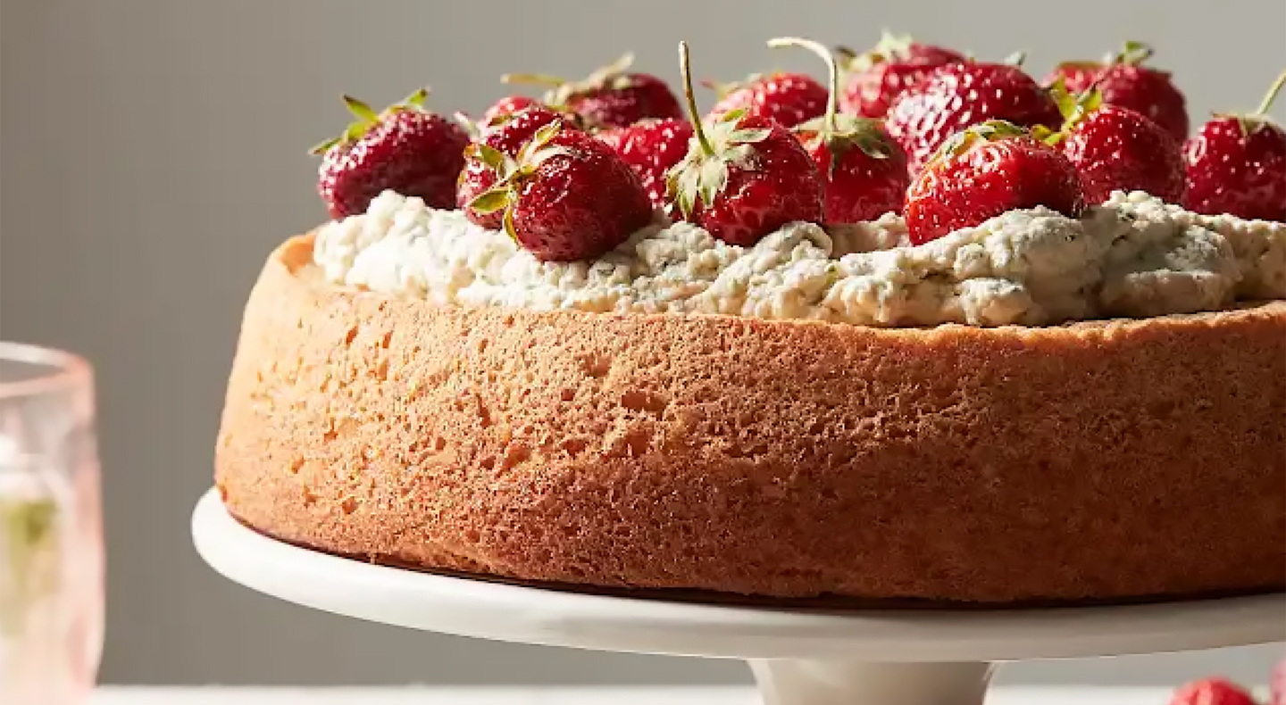 Chiffon cake with strawberries on top Chiffon cake with strawberries on top