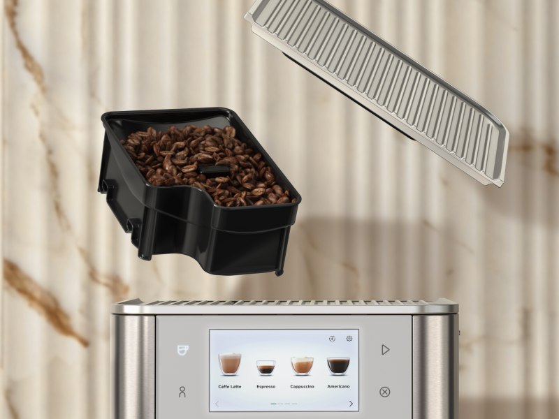 Espresso bean hopper above espresso machine