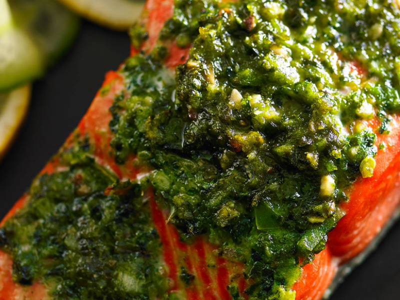 Roasted salmon topped with homemade pesto Roasted salmon topped with homemade pesto