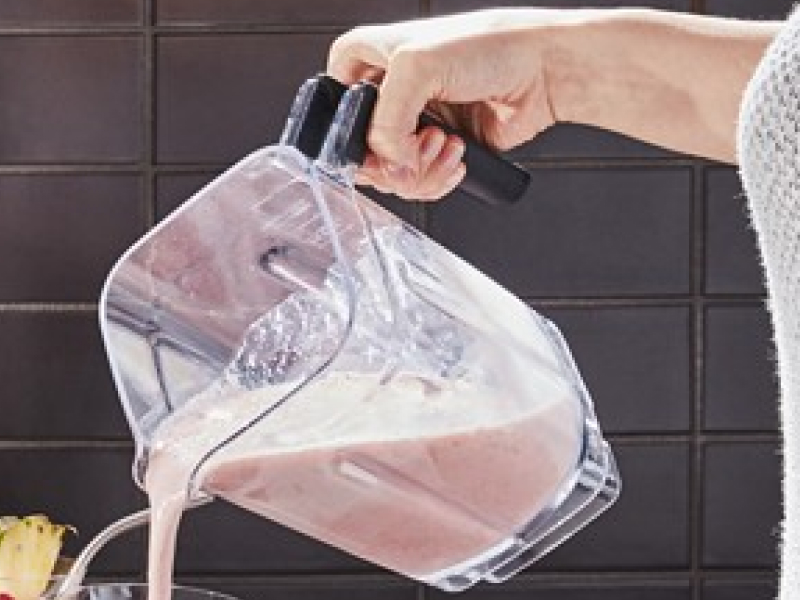 Frosé being poured from a KitchenAid® blender