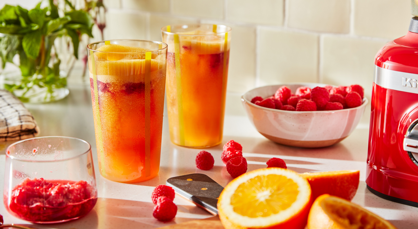 Frozen drinks with raspberries and oranges Frozen drinks with raspberries and oranges