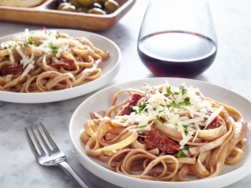 Two plates of pasta Two plates of pasta