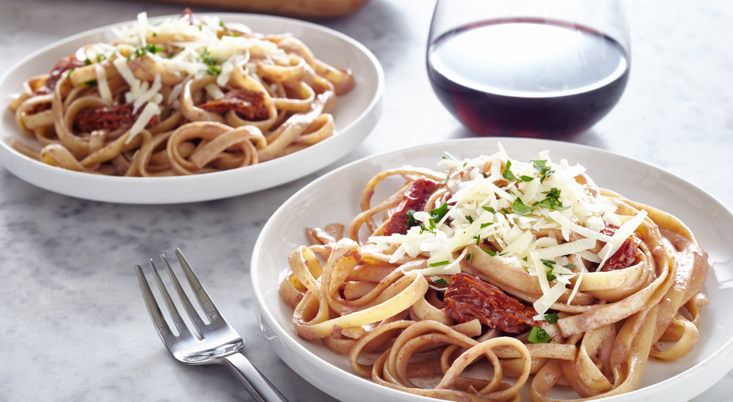 Two plates of pasta Two plates of pasta