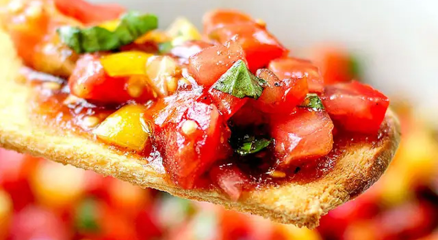 Bruschetta on a thin piece of bread. Bruschetta on a thin piece of bread.