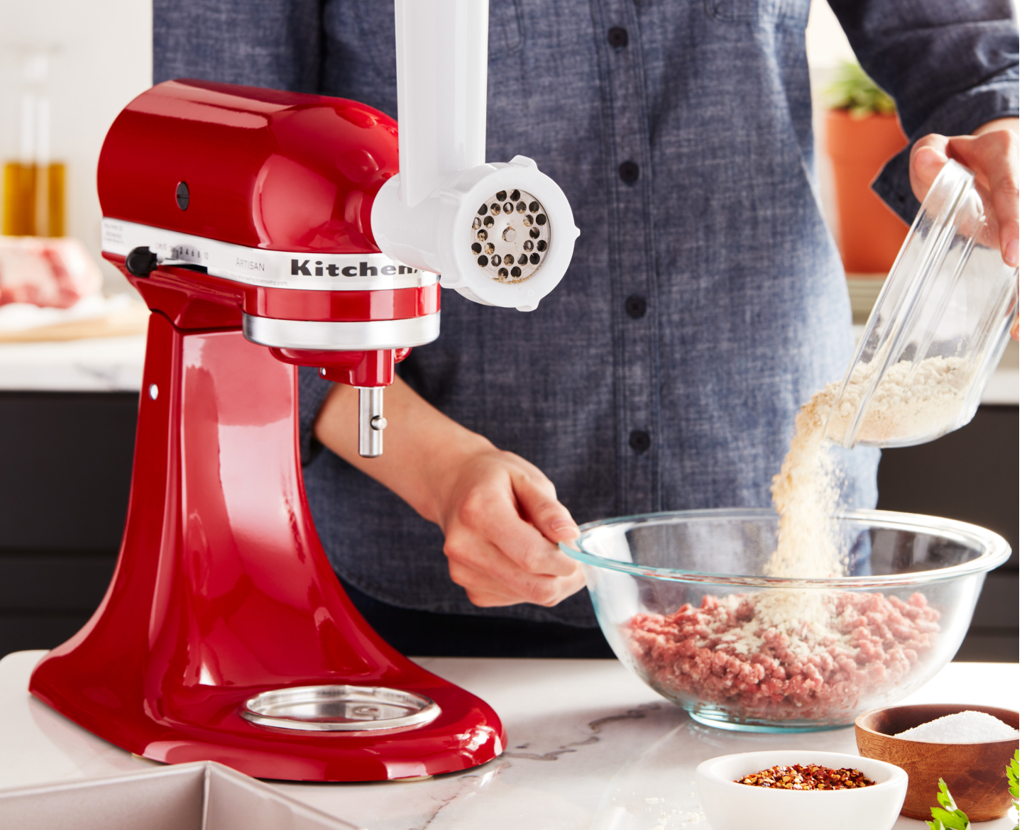 Red KitchenAid® stand mixer with Meat Grinder Attachment Red KitchenAid® stand mixer with Meat Grinder Attachment