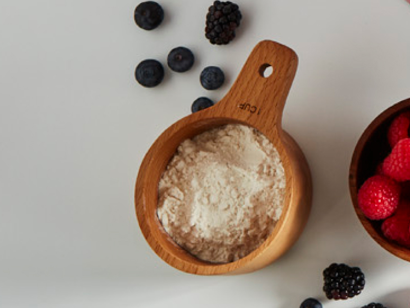 Protein powder in a measuring cup
