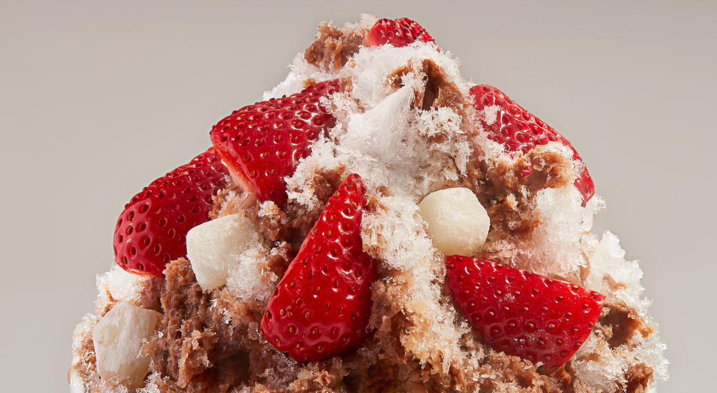 A mound of chocolate strawberry shave ice