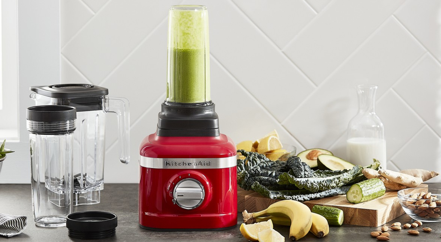 Red KitchenAid® blender with personal blender jar