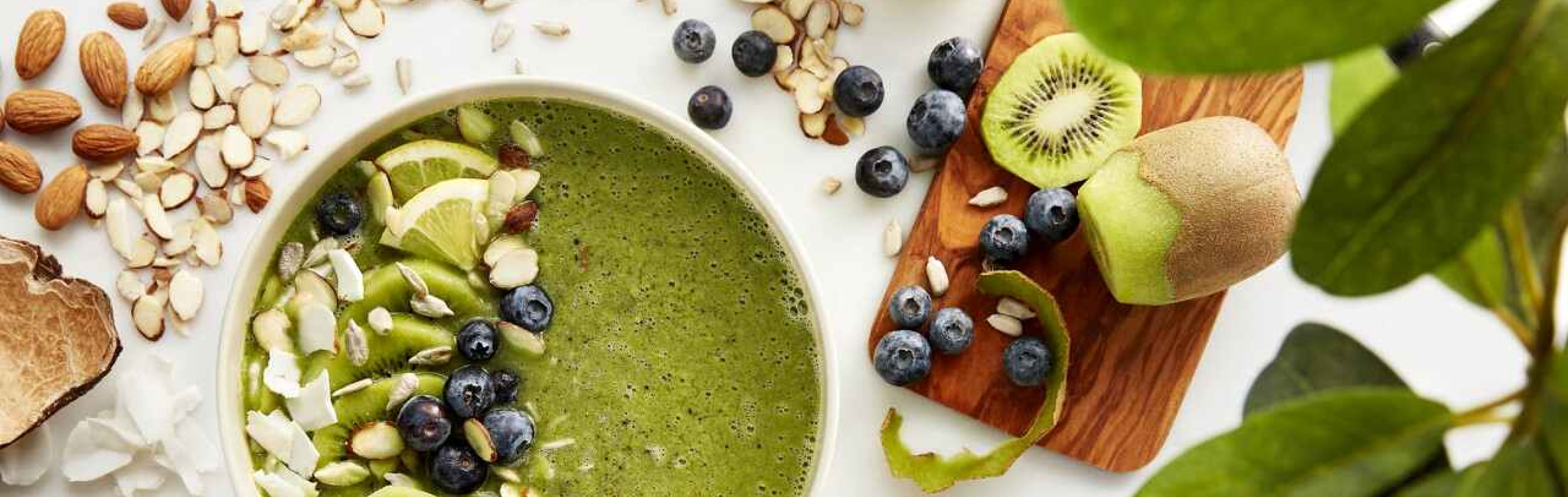Smoothie bowl next to fresh fruit