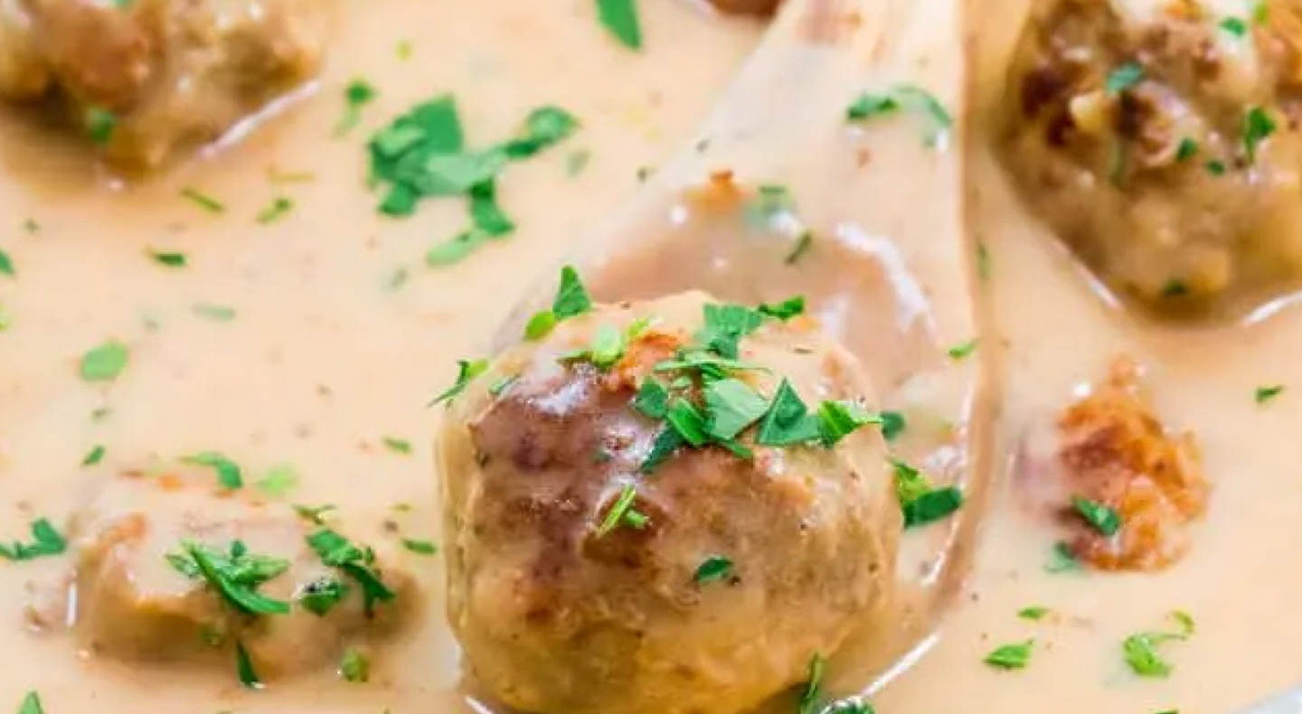 Swedish meatball on wooden spoon Swedish meatball on wooden spoon