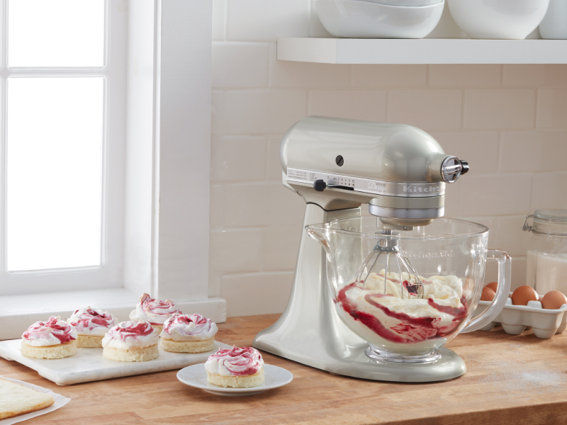KitchenAid® stand mixer mixing whipped cream with fruit sauce KitchenAid® stand mixer mixing whipped cream with fruit sauce