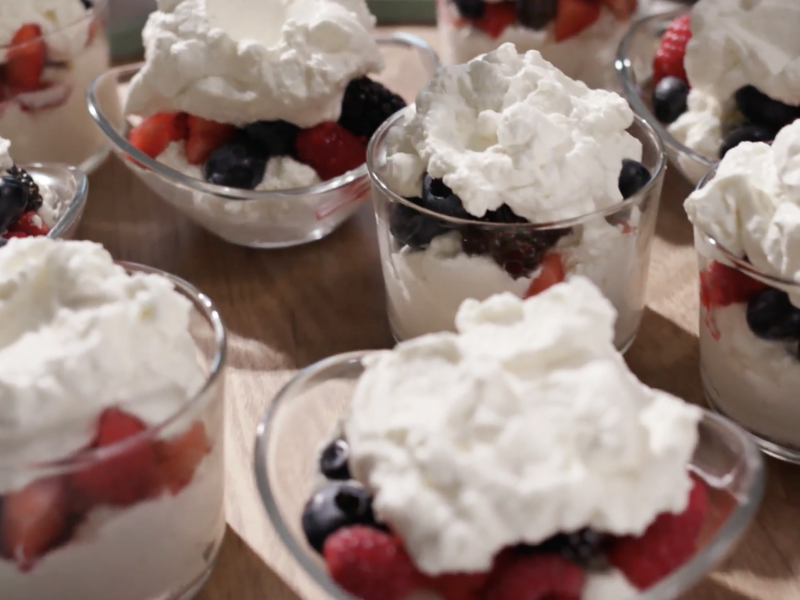Fruit parfait topped with whipped cream Fruit parfait topped with whipped cream