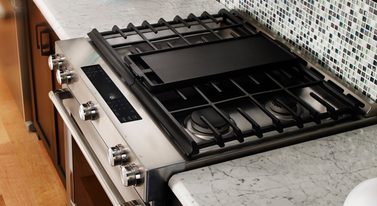 A griddle on a gas stove A griddle on a gas stove