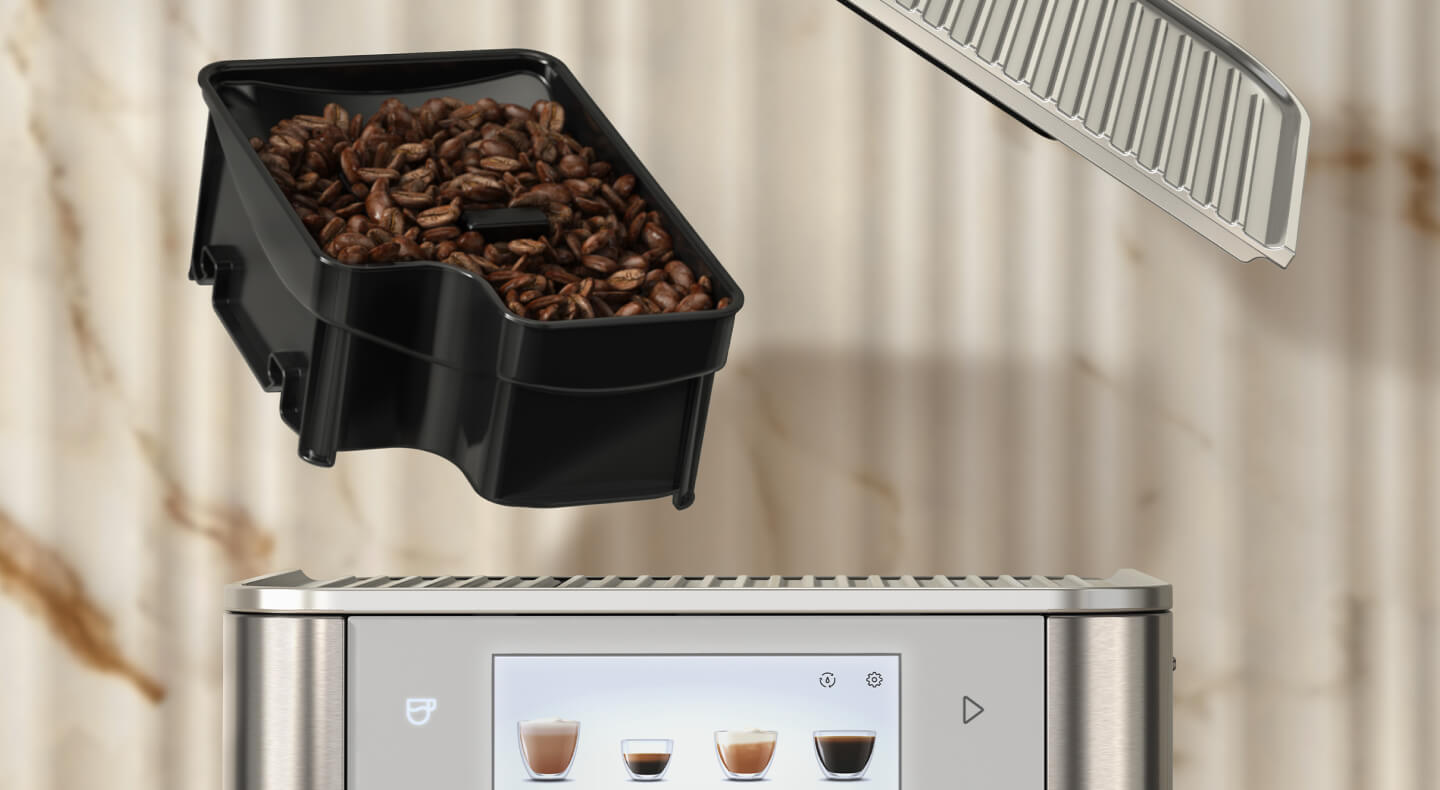 Espresso beans inside a KitchenAid® espresso machine bean hopper