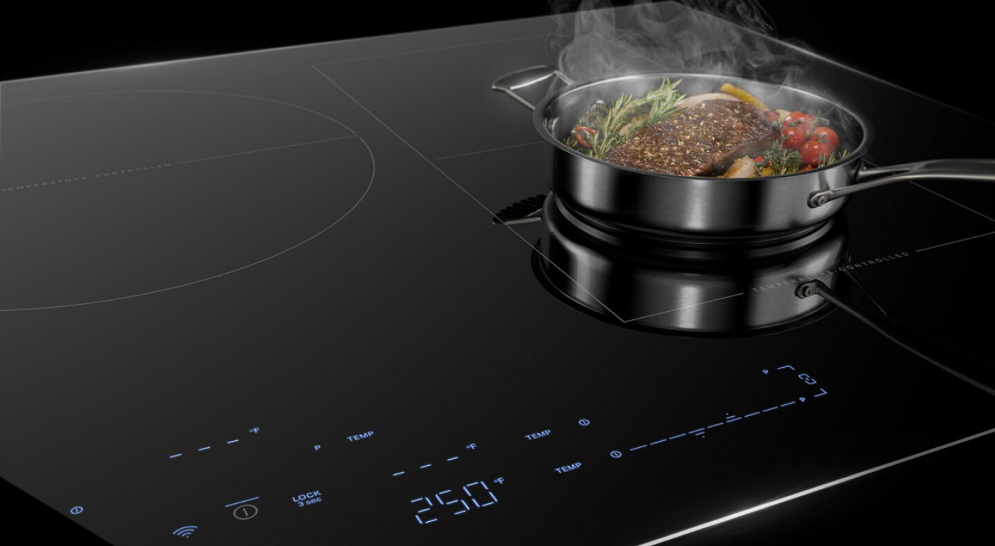 An induction cooktop with steak in a pan on it