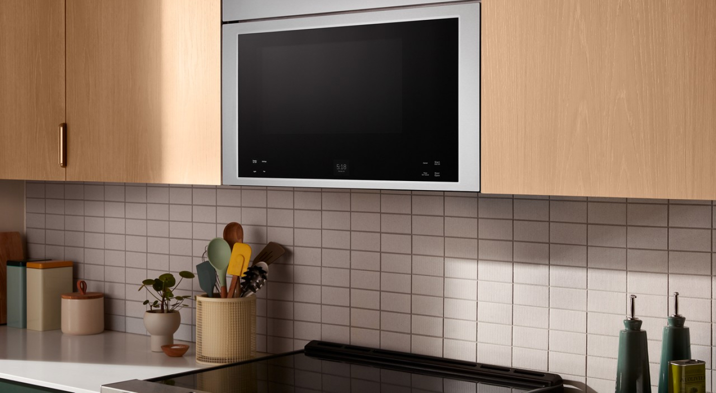 Flush KitchenAid® built in microwave over an electric cooktop