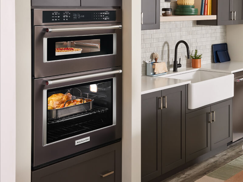 KitchenAid® built-in combination oven in a kitchen KitchenAid® built-in combination oven in a kitchen