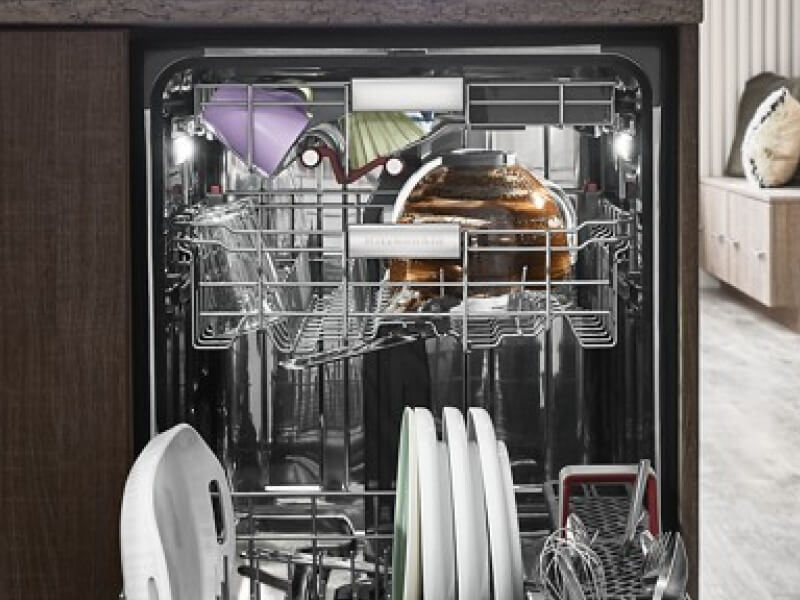A fully loaded third rack dishwasher