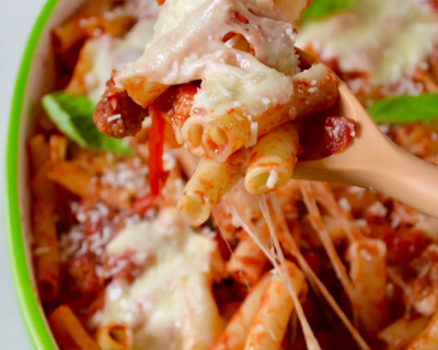 Baked ziti on wooden spoon