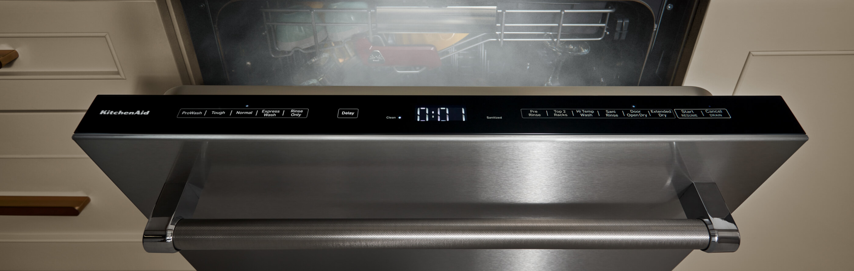 Dishwasher open with steam coming out