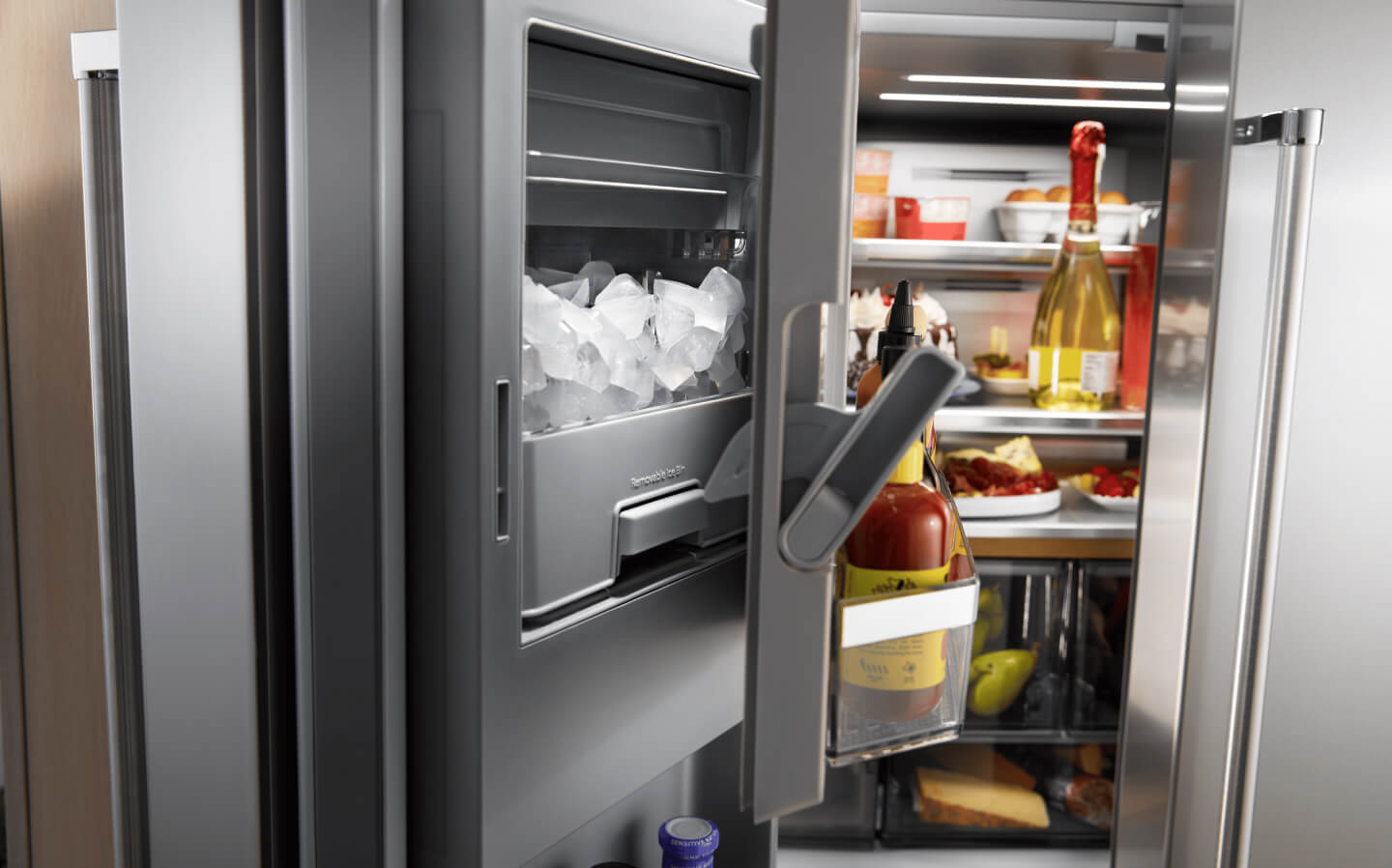 An in-door ice dispenser in a refrigerator An in-door ice dispenser in a refrigerator